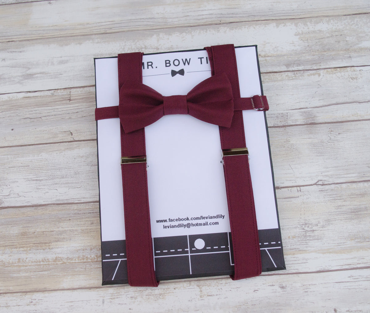 wine red bow tie and suspenders